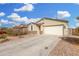 Beautiful single-Gathering home featuring a two-car garage and stone veneer accents at 7234 E Eagle Nest Way, San Tan Valley, AZ 85143