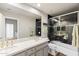 Modern bathroom with dual sinks, quartz countertops, a glass-enclosed shower, and a bathtub offers a spa-like experience at 7282 E Del Acero Dr, Scottsdale, AZ 85258