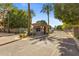 Gated community entrance featuring a security booth and well-maintained landscaping ensures safety and privacy at 7282 E Del Acero Dr, Scottsdale, AZ 85258