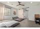 This bedroom has a minimalist aesthetic with floor cushions and a barn-style sliding door at 7324 E Vista Bonita Dr, Scottsdale, AZ 85255