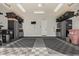 A garage with epoxy floors and plenty of storage at 7324 E Vista Bonita Dr, Scottsdale, AZ 85255