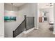 Hallway with carpet flooring and wood railing at 7324 E Vista Bonita Dr, Scottsdale, AZ 85255