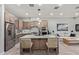 This kitchen features an island with seating and modern appliances at 7324 E Vista Bonita Dr, Scottsdale, AZ 85255