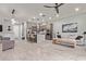 Open-concept living space with a kitchen island and neutral color palette, flowing layout, and modern finishes at 7324 E Vista Bonita Dr, Scottsdale, AZ 85255