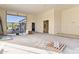 Spacious living room featuring large window openings and ample natural light at 8230 N Mockingbird Ln, Paradise Valley, AZ 85253