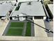 Aerial view of property showcasing roof, hardscape and artificial turf at 8833 N 39Th Ave, Phoenix, AZ 85051