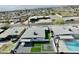 Aerial view of home, backyard with artificial turf, and in-ground pool at 8833 N 39Th Ave, Phoenix, AZ 85051