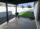 Cozy covered patio with BBQ, artificial turf, and paver patio area at 8833 N 39Th Ave, Phoenix, AZ 85051