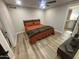 Bedroom with wood floors, ceiling fan, and a rustic feel at 8833 N 39Th Ave, Phoenix, AZ 85051