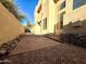 A view of the backyard showcasing a stone and gravel landscape at 9065 E Gary Rd # 129, Scottsdale, AZ 85260