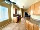 Well-lit kitchen featuring granite countertops, modern appliances, and tile flooring at 9065 E Gary Rd # 129, Scottsdale, AZ 85260