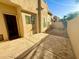 Wide angle view of a charming outdoor patio with a mixture of stone and concrete at 9065 E Gary Rd # 129, Scottsdale, AZ 85260