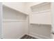 This is a closet with wood floors and wire shelving at 10131 W El Cortez Pl, Peoria, AZ 85383