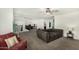 Loft featuring carpet and access to upstairs bedrooms and bathrooms at 11509 W Boca Raton Rd, El Mirage, AZ 85335