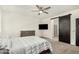 Bedroom with neutral walls, a ceiling fan, and carpet at 11509 W Boca Raton Rd, El Mirage, AZ 85335