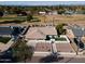 Aerial view of a well-maintained home with a pool and an expansive golf course in the backyard at 120 W Thunderbird Rd, Phoenix, AZ 85023