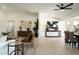 Spacious living area featuring modern decor and hardwood floors leading to the dining area at 120 W Thunderbird Rd, Phoenix, AZ 85023