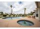 Inviting backyard pool and spa with desert landscaping and poolside seating, perfect for relaxing or entertaining guests at 120 W Thunderbird Rd, Phoenix, AZ 85023