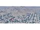 An aerial shot features a residential neighborhood nestled in a scenic desert landscape near the mountains at 14236 N 28Th St, Phoenix, AZ 85032