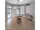 Bright breakfast nook with shuttered windows, a charming chandelier, and a cozy dining set at 14236 N 28Th St, Phoenix, AZ 85032