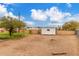 This home's backyard has a detached shed and low-maintenance landscape at 14608 N Montego Ct, Phoenix, AZ 85053