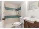 Bathroom featuring a shower, toilet, vanity, sink, and mirror at 14608 N Montego Ct, Phoenix, AZ 85053