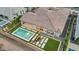 Aerial perspective of a private backyard with a pool, fire pit, and ample space for entertaining guests at 1464 E Aris Dr, Gilbert, AZ 85298