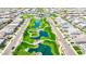 Aerial view of a community park with ponds, fountain, walkways, and lush landscaping at 1464 E Aris Dr, Gilbert, AZ 85298