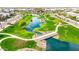 A picturesque aerial view of a community park featuring walking paths and water features at 1464 E Aris Dr, Gilbert, AZ 85298