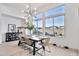 Bright dining area with big picturesque windows looking out to the back yard at 1464 E Aris Dr, Gilbert, AZ 85298