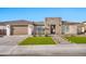 Charming single-story home features a desert-landscaped front yard and an inviting stone entryway at 1464 E Aris Dr, Gilbert, AZ 85298