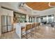 Well-equipped clubhouse kitchen with island seating and stainless steel appliances at 1464 E Aris Dr, Gilbert, AZ 85298