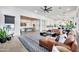 Spacious living room with view into the game room and gourmet kitchen at 1464 E Aris Dr, Gilbert, AZ 85298