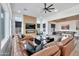 Large living room featuring a fireplace, big screen tv, and comfortable sectional sofa at 1464 E Aris Dr, Gilbert, AZ 85298