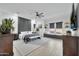 Elegantly designed main bedroom with a statement wall, modern decor, and ample space at 1464 E Aris Dr, Gilbert, AZ 85298