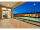 Open patio leading to the inviting pool and fire pit, perfect for outdoor relaxation and entertaining at 1464 E Aris Dr, Gilbert, AZ 85298