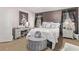 Well-appointed bedroom with decorative accents, a vanity area, and soft carpet at 15240 W Melissa Ln, Surprise, AZ 85374