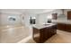Spacious kitchen features granite countertops, stainless steel appliances, and a kitchen island at 17821 W Getty Dr, Goodyear, AZ 85338