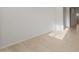 Open-concept living room with tile floors and plenty of natural light at 17821 W Getty Dr, Goodyear, AZ 85338