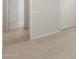 Spacious bedroom featuring neutral carpet and views into tiled hallway with white doors and trim at 17845 W Getty Dr, Goodyear, AZ 85338