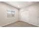 Bedroom with closet and large window offering ample natural light at 17851 W Getty Dr, Goodyear, AZ 85338
