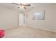 A bright and airy bedroom with neutral colors at 19703 W Badgett Ln, Litchfield Park, AZ 85340