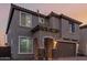 Charming two-story home with a two-car garage and covered entryway at 19703 W Badgett Ln, Litchfield Park, AZ 85340