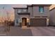 Charming two-story home with a two-car garage and covered entryway at 19703 W Badgett Ln, Litchfield Park, AZ 85340