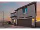 Charming two-story home with a two-car garage and covered entryway at 19703 W Badgett Ln, Litchfield Park, AZ 85340