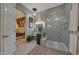 Stylish bathroom showcasing decorative tile in the glass enclosed shower at 20766 W White Rock Rd, Buckeye, AZ 85396