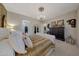 Elegant bedroom featuring a decorative chandelier and a walk-in closet at 20766 W White Rock Rd, Buckeye, AZ 85396