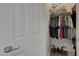 Open closet with clothing racks, featuring a variety of shirts and storage on the top shelf at 20766 W White Rock Rd, Buckeye, AZ 85396