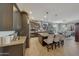Open kitchen with stainless steel appliances, granite countertops and a large island at 20766 W White Rock Rd, Buckeye, AZ 85396