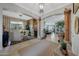 Spacious living room with high ceilings, custom mural, and stylish decor at 20766 W White Rock Rd, Buckeye, AZ 85396